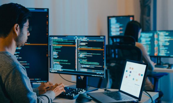 Group Adult Asia male, female freelance typing write prompt AI bot IT app smart program nomad, video game, terminal with coding language, designer, big data center on computer in night office.